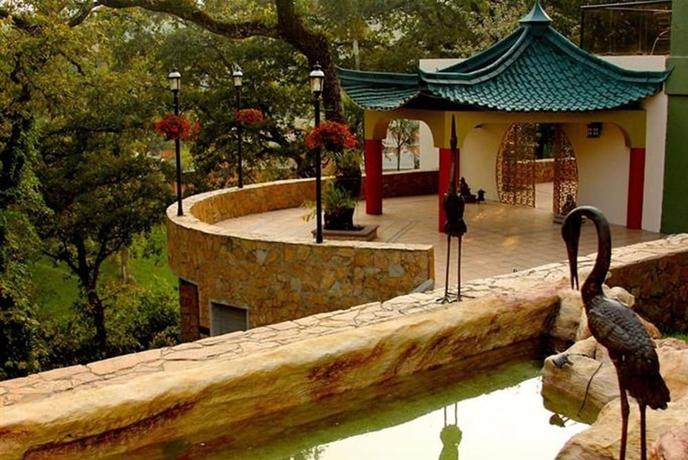 Imagen de los exteriores del Hotel Suites Jardin Imperial. Foto 16