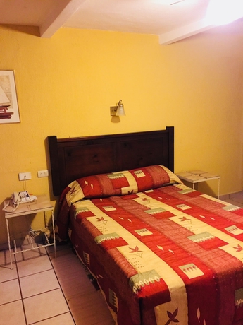 Imagen de la habitación del Hotel Suites Kino. Foto 3