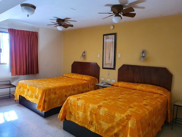 Imagen de la habitación del Hotel Suites Kino. Foto 6