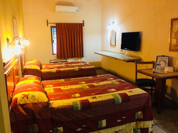 Imagen de la habitación del Hotel Suites Kino. Foto 12