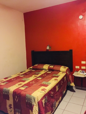 Imagen de la habitación del Hotel Suites Kino. Foto 14