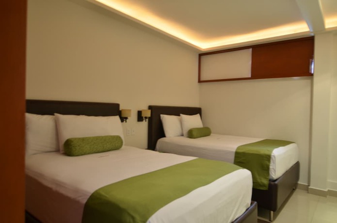 Imagen de la habitación del Hotel Suites La Concordia. Foto 11