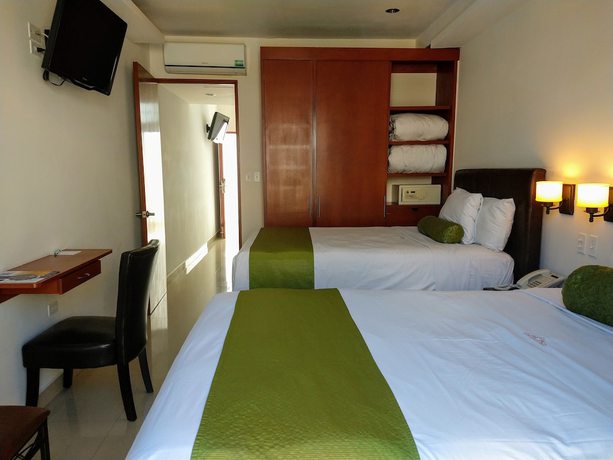 Imagen de la habitación del Hotel Suites La Concordia. Foto 13