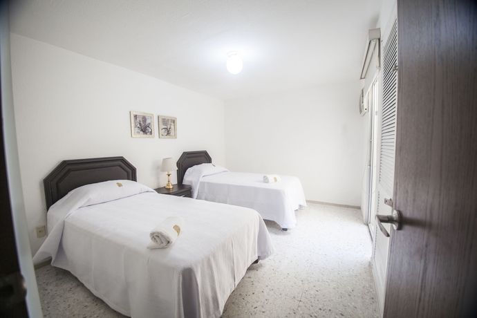 Imagen de la habitación del Hotel Suites La Fragua. Foto 7