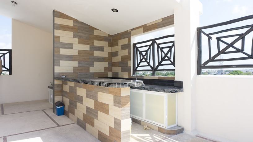 Imagen de la habitación del Hotel Suites La Roca. Foto 4