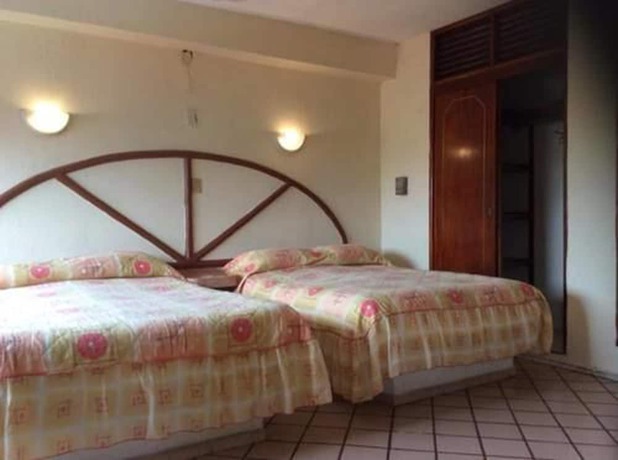 Imagen de la habitación del Hotel Suites Licha Acapulco. Foto 2