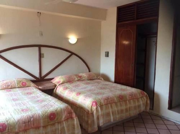 Imagen de la habitación del Hotel Suites Licha Acapulco. Foto 11