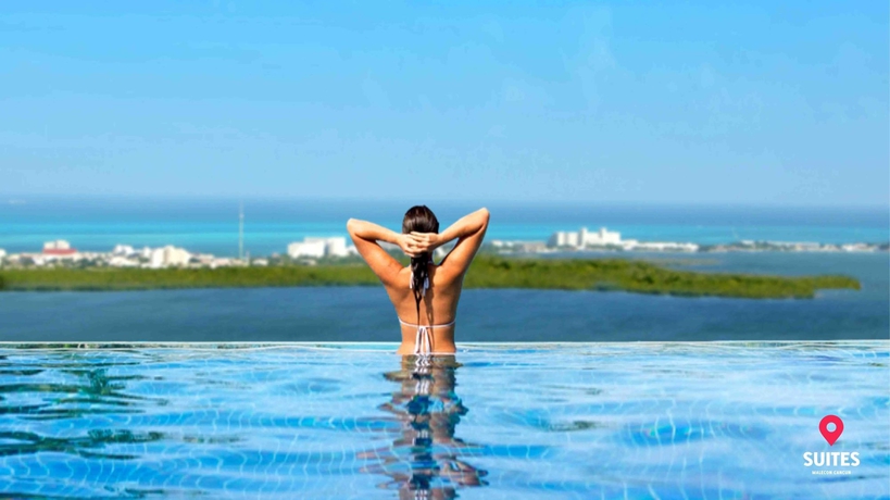 Imagen de la piscina del Hotel Suites Malecon Cancun. Foto 10
