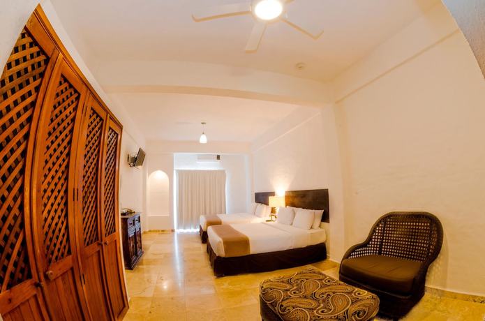 Imagen de la habitación del Hotel Suites Mar Elena. Foto 5