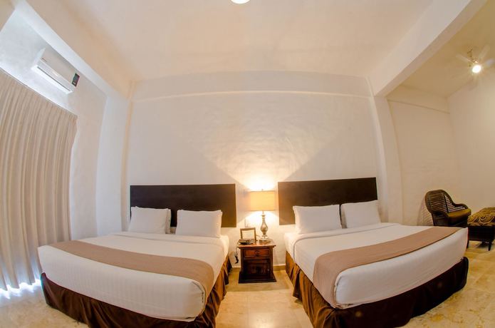Imagen de la habitación del Hotel Suites Mar Elena. Foto 7