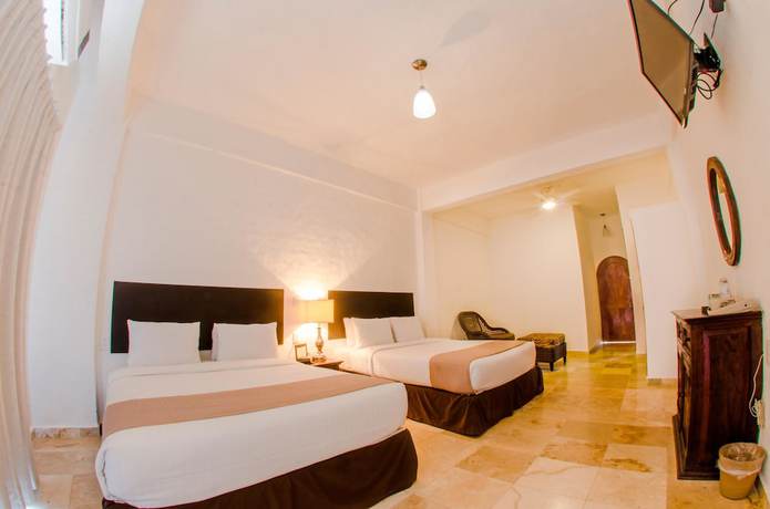 Imagen de la habitación del Hotel Suites Mar Elena. Foto 10