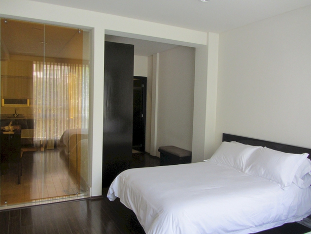 Imagen de la habitación del Hotel Suites Masliah. Foto 3