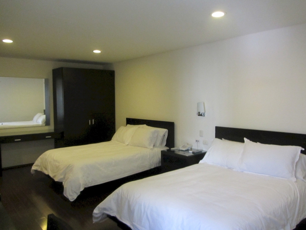 Imagen de la habitación del Hotel Suites Masliah. Foto 7