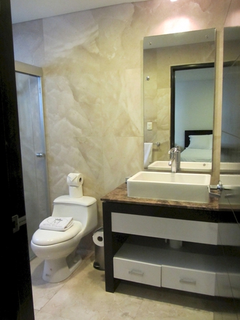 Imagen de la habitación del Hotel Suites Masliah. Foto 8