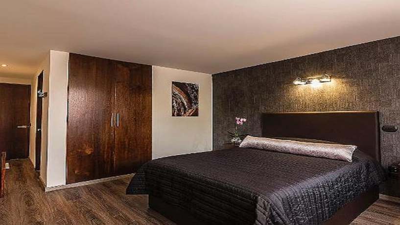 Imagen de la habitación del Hotel Suites Meson del Cid. Foto 14