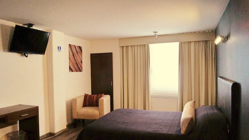 Imagen de la habitación del Hotel Suites Meson del Cid. Foto 15