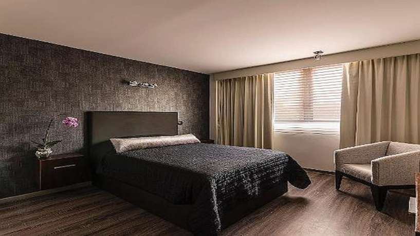 Imagen de la habitación del Hotel Suites Meson del Cid. Foto 17