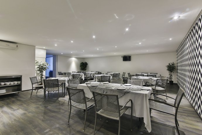 Imagen del bar/restaurante del Hotel Suites Meson del Cid. Foto 7
