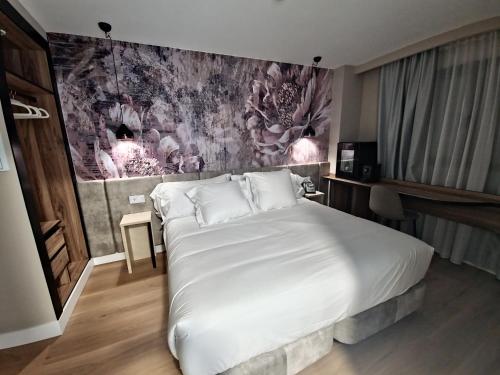 Imagen de la habitación del Hotel Suites Moma Centro. Foto 20