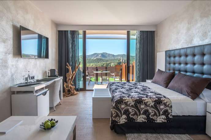 Imagen de la habitación del Hotel Suites Natura Mas Tapiolas. Foto 8