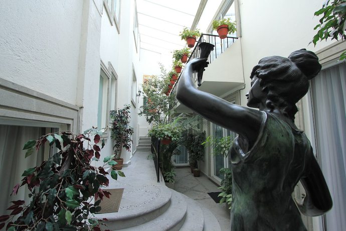 Imagen de la habitación del Hotel Suites Newton. Foto 11