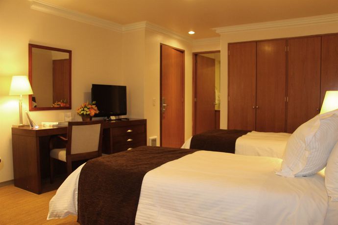 Imagen de la habitación del Hotel Suites Obelisk. Foto 11