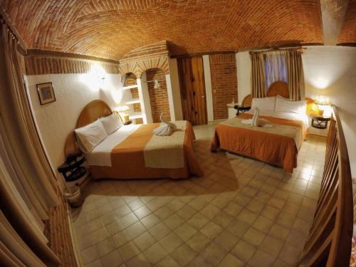 Imagen de la habitación del Hotel Suites Paraiso Tx. Foto 6