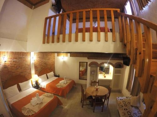 Imagen de la habitación del Hotel Suites Paraiso Tx. Foto 8