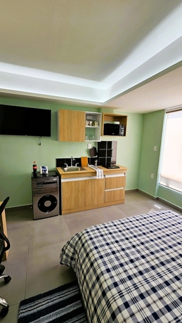 Imagen de la habitación del Hotel Suites Plaza Acequia. Foto 1