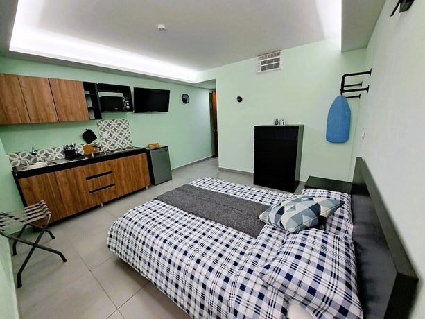 Imagen de la habitación del Hotel Suites Plaza Acequia. Foto 3