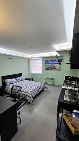 Imagen de la habitación del Hotel Suites Plaza Acequia. Foto 4