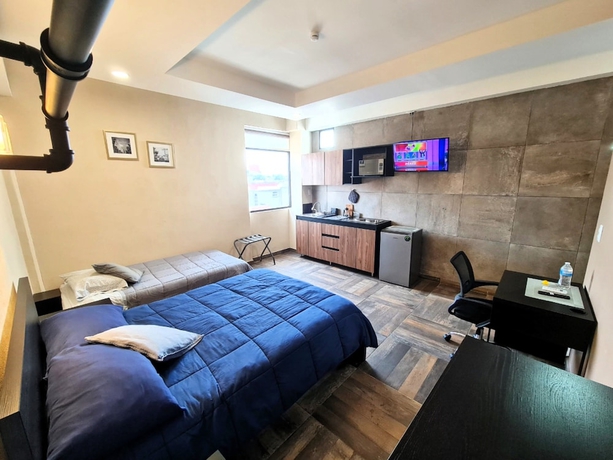 Imagen de la habitación del Hotel Suites Plaza Acequia. Foto 5