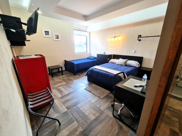 Imagen de la habitación del Hotel Suites Plaza Acequia. Foto 11