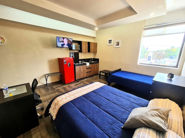 Imagen de la habitación del Hotel Suites Plaza Acequia. Foto 12