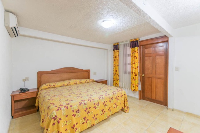 Imagen de la habitación del Hotel Suites Poliforum Inn, Le&oacute;n. Foto 7