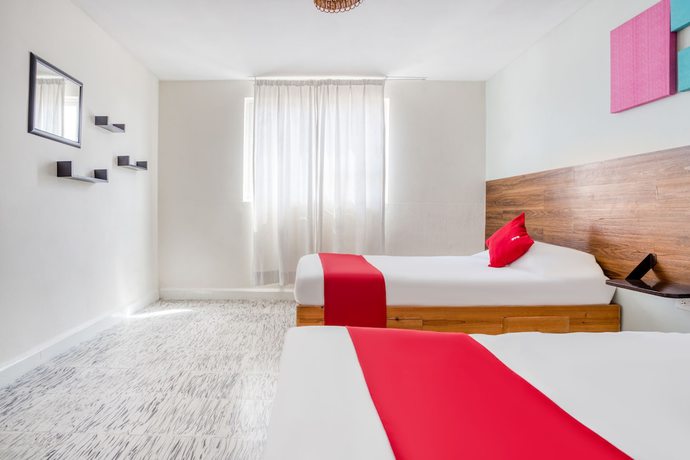 Imagen de la habitación del Hotel Suites Puebla. Foto 7
