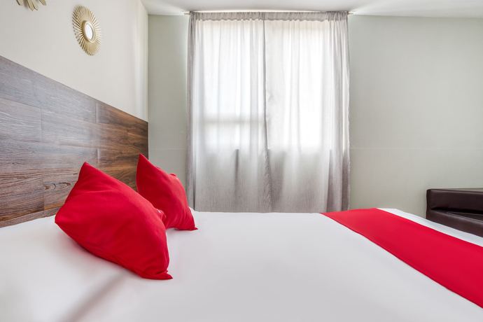 Imagen de la habitación del Hotel Suites Puebla. Foto 10