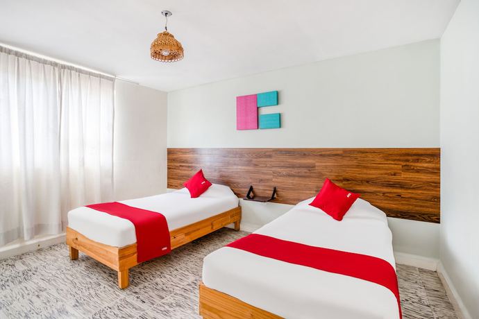 Imagen de la habitación del Hotel Suites Puebla. Foto 11