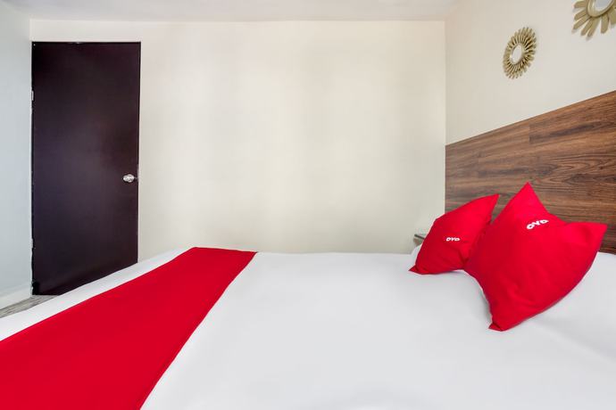 Imagen de la habitación del Hotel Suites Puebla. Foto 15