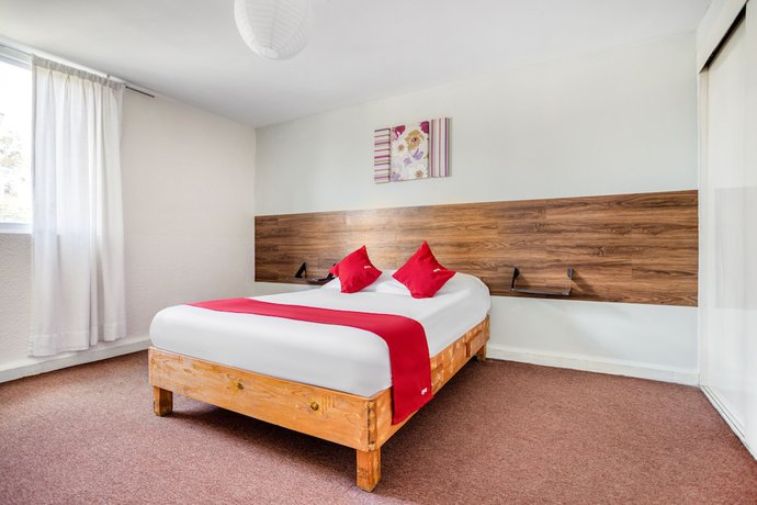 Imagen de la habitación del Hotel Suites Puebla. Foto 16