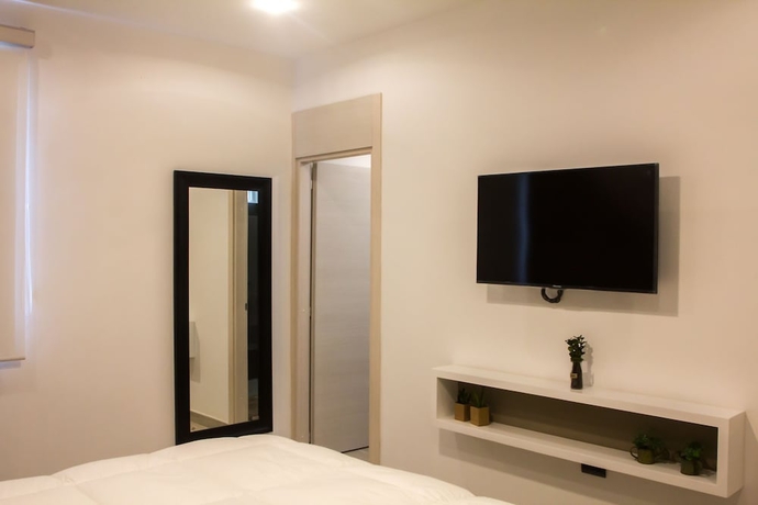 Imagen de la habitación del Hotel Suites Quinto Sol - Near Mamitas Beach Club. Foto 5