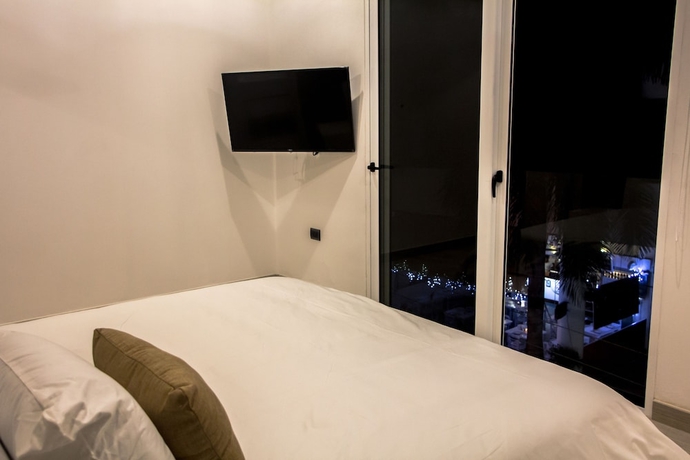 Imagen de la habitación del Hotel Suites Quinto Sol - Near Mamitas Beach Club. Foto 11