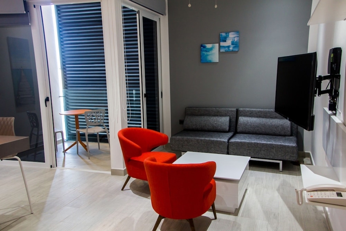 Imagen de la habitación del Hotel Suites Quinto Sol - Near Mamitas Beach Club. Foto 16