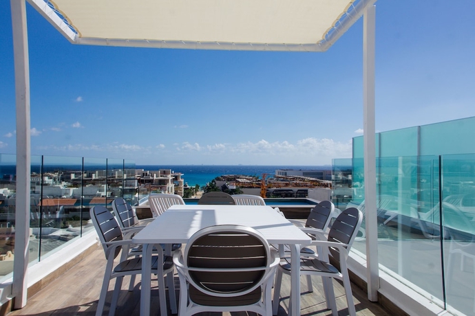 Imagen de la habitación del Hotel Suites Quinto Sol - Near Mamitas Beach Club. Foto 17