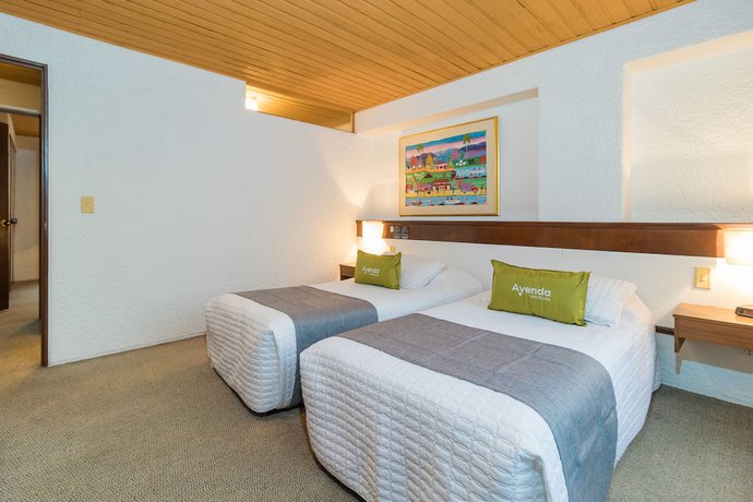 Imagen de la habitación del Hotel Suites Real 97. Foto 5