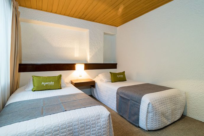 Imagen de la habitación del Hotel Suites Real 97. Foto 10