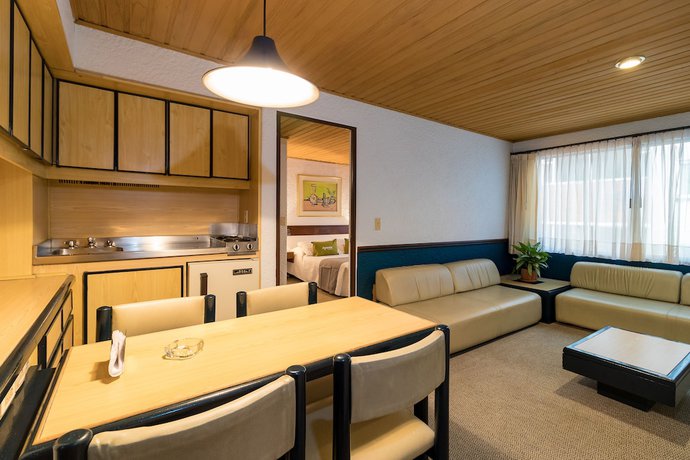 Imagen de la habitación del Hotel Suites Real 97. Foto 11