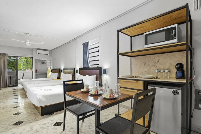 Imagen de la habitación del Hotel Suites Reforma by Homirent. Foto 19