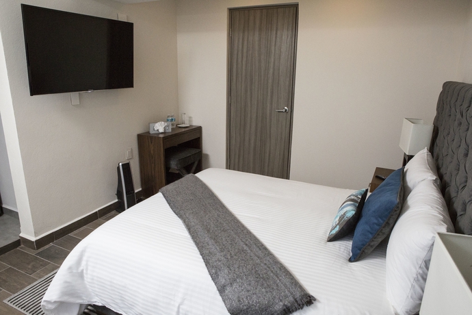 Imagen de la habitación del Hotel Suites Rio Elba. Foto 7