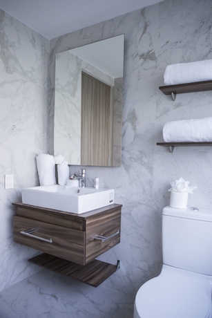 Imagen de la habitación del Hotel Suites Rio Elba. Foto 10